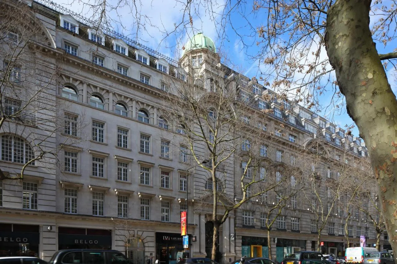 Historic building exterior with clock tower near The Z Hotel Holborn